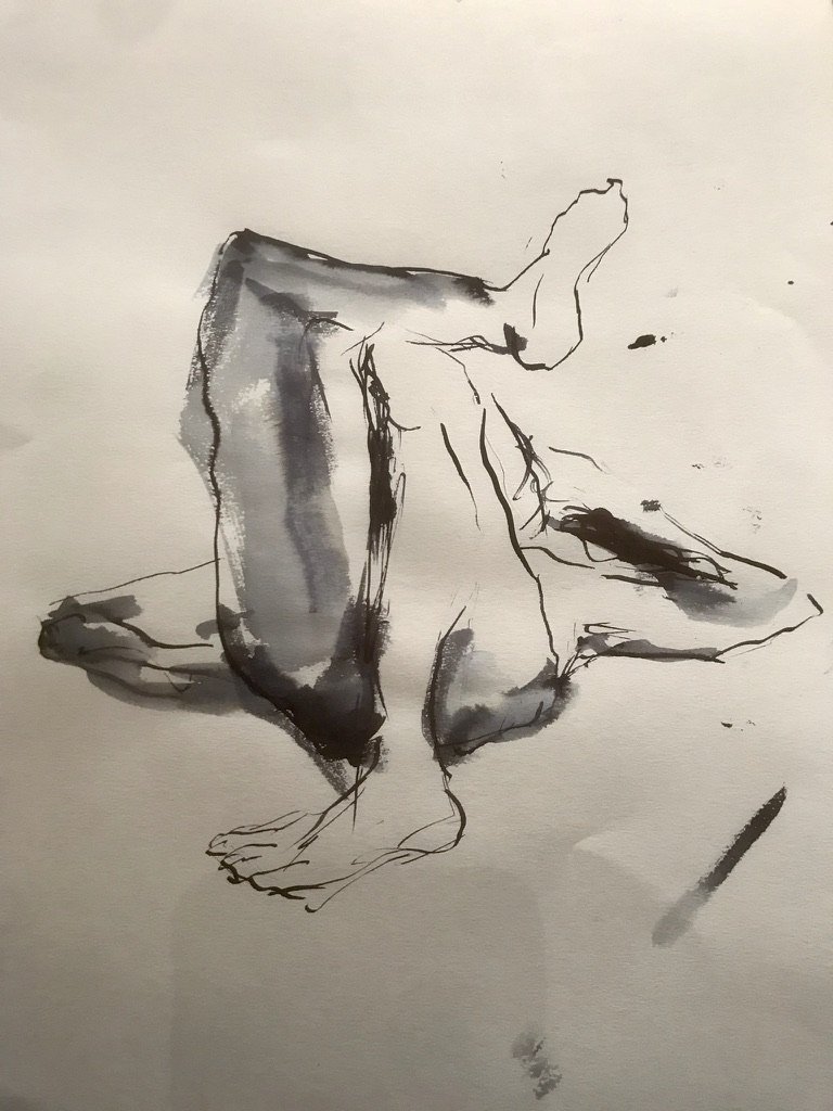 Ink wash life study of a seated figure, legs folded