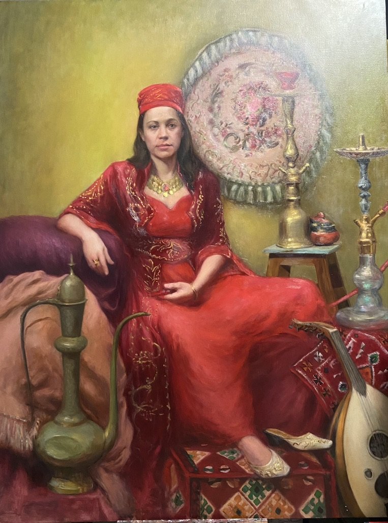 A woman in a red embroidered Ottoman-style dress, seated beside a hookah, an oud, and a brass jug